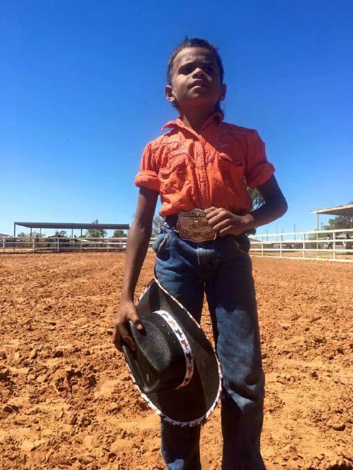 Young star: Peter Gregory Jnr is eager to return home to Doomadgee to defend his Poddy Calf Ride title in the Indigenous Rodeo Championships, during the festival.