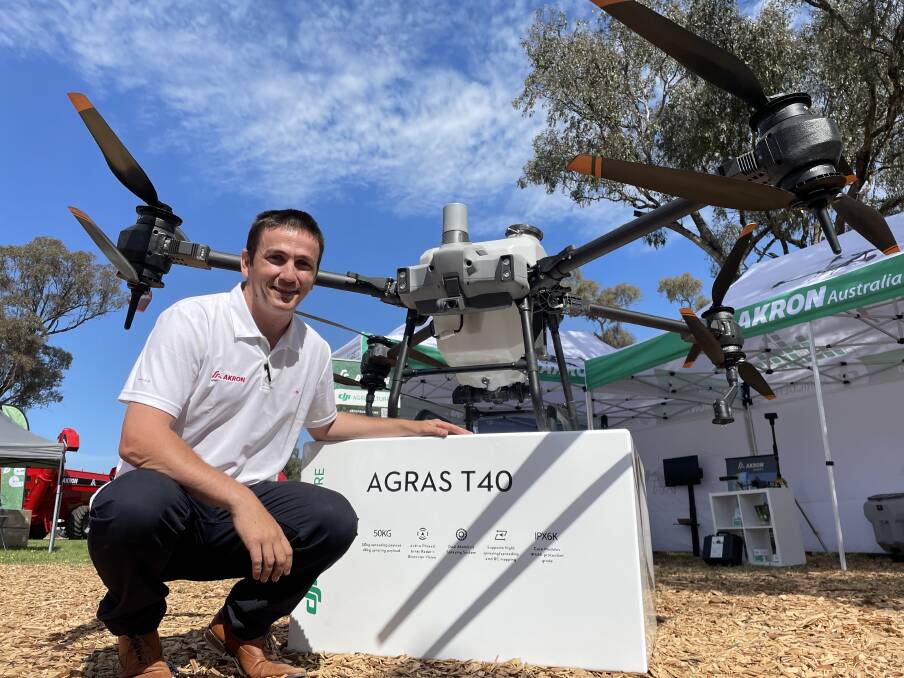 Jimmy O'Neill, Akron Australia chief executive officer, with the Agras T40 drone at Henty Machinery Field Days. Picture by Andrew Norris.