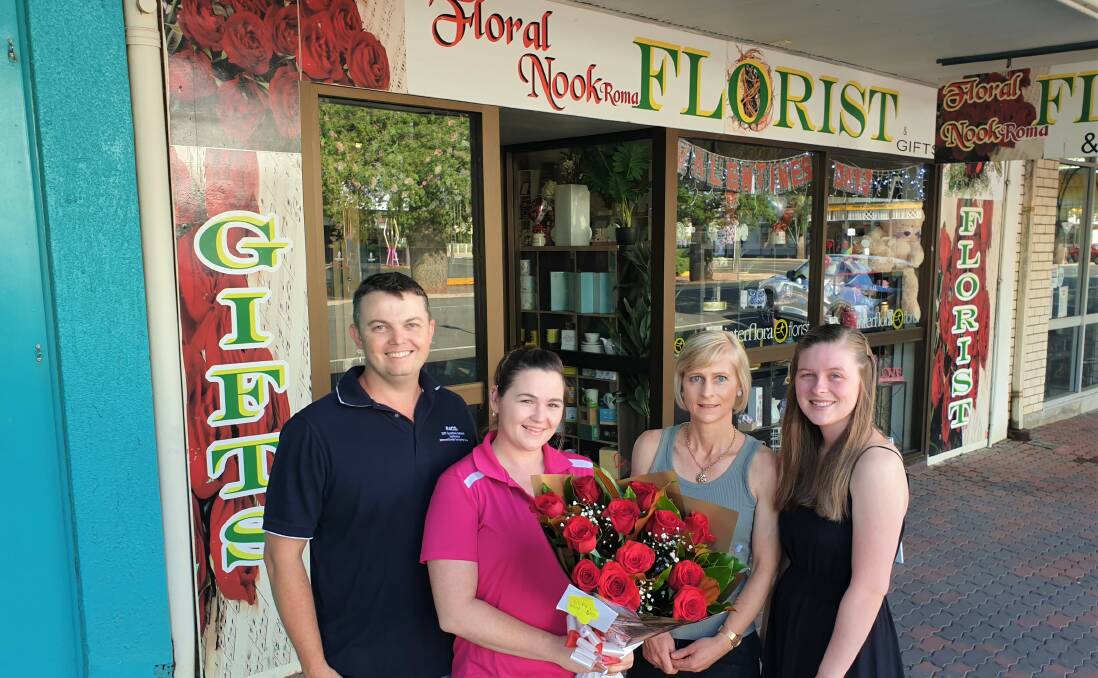 Chris Taylor and Courtney Fisher, owner of the Floral Nook in Roma, along with former owner Hayley Rodgers and daughter Maddie Rodgers, all hard at work on Valentine's Day.