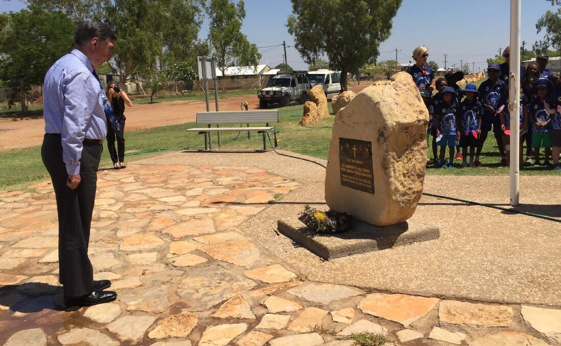Lest we forget: Mount Isa mayor Tony McGrady lays a wreath at the Camooweal cenotaph on Wednesday. Picture: Sally Cripps.