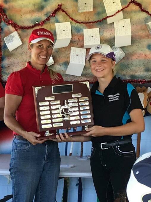 Cherie Dooley presented Brooke Johnson with Pony Clubber of the Year Trophy at the Yeppoon Hack and Pony Club's Awards afternoon.