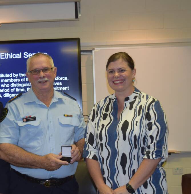 Samford Rural Fire Brigade first officer Fergus Adrian with state Fire Minister Nikki Boyd. Picture: Supplied