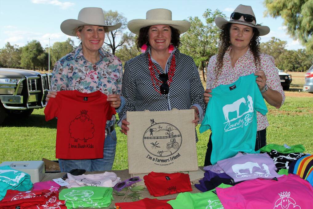 The three Mobbs sisters - Bridget Knight, Charleville, Tricia Agar, Wyandra, and Kaye Minnett, Gowrie - with items from their bush store.