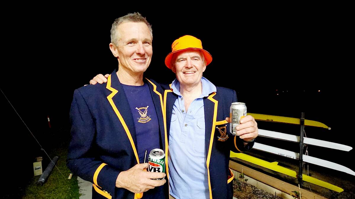 Vikings rowers, David Counsell, Barcaldine, and Toby Ford, Brisbane, toast the success of the inaugural outback rowing regatta. Pictures: Sally Gall