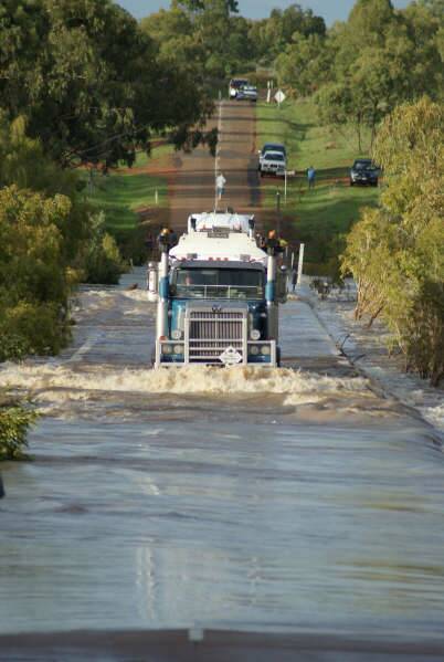 A road train making its way over a flooded crossing in northern Queensland. Picture supplied.