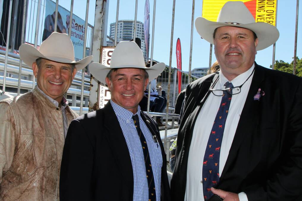 Gene Kubecka, pictured with Nebo's Craig Rose and Rob Sinnamon, Yugilbar Stud, was ringside at the Ekka to talk up the Santa Gertrudis world congress being held in the US in 2019.