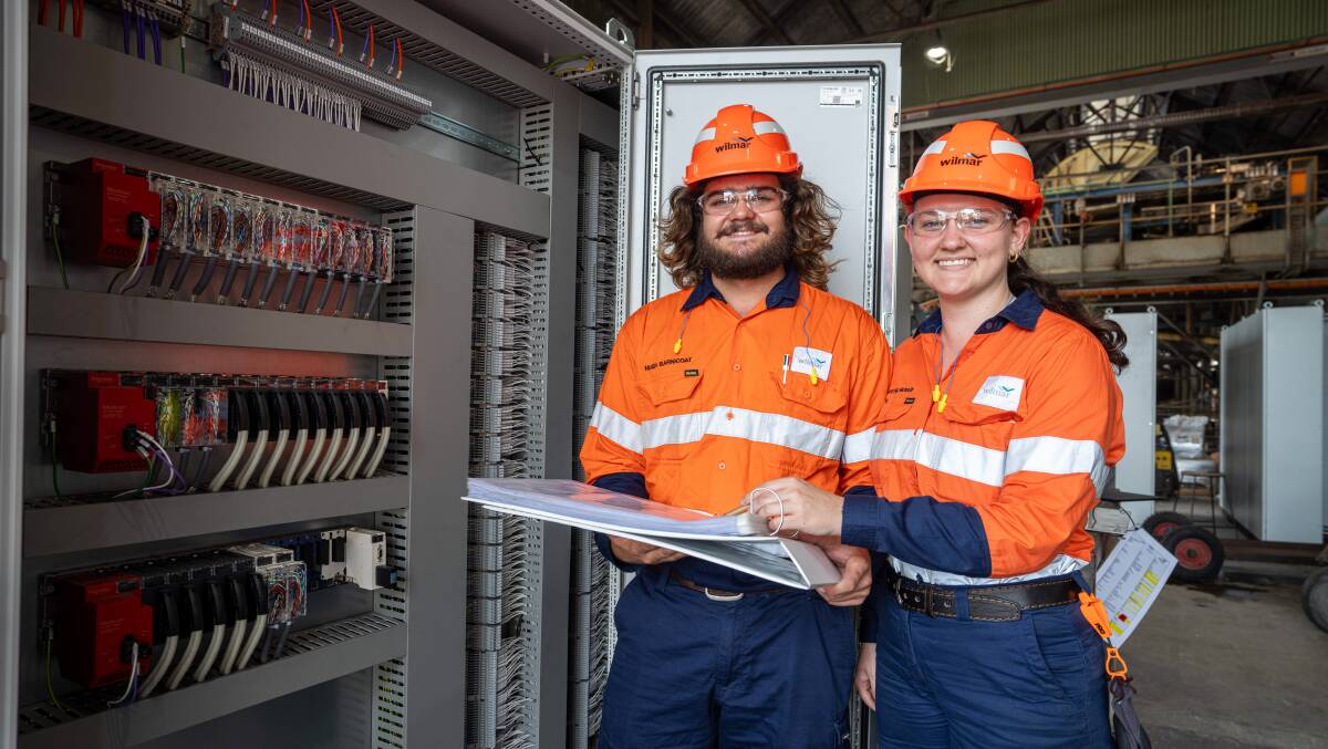 Electrical apprentices Hugh Barnicoat and Cadey McMurray are looking forward to working with Wilmars state-of-the-art equipment. Hugh is based at Pioneer Mill in the Burdekin and Cadey is based at Victoria Mill in the Herbert. Picture: Supplied