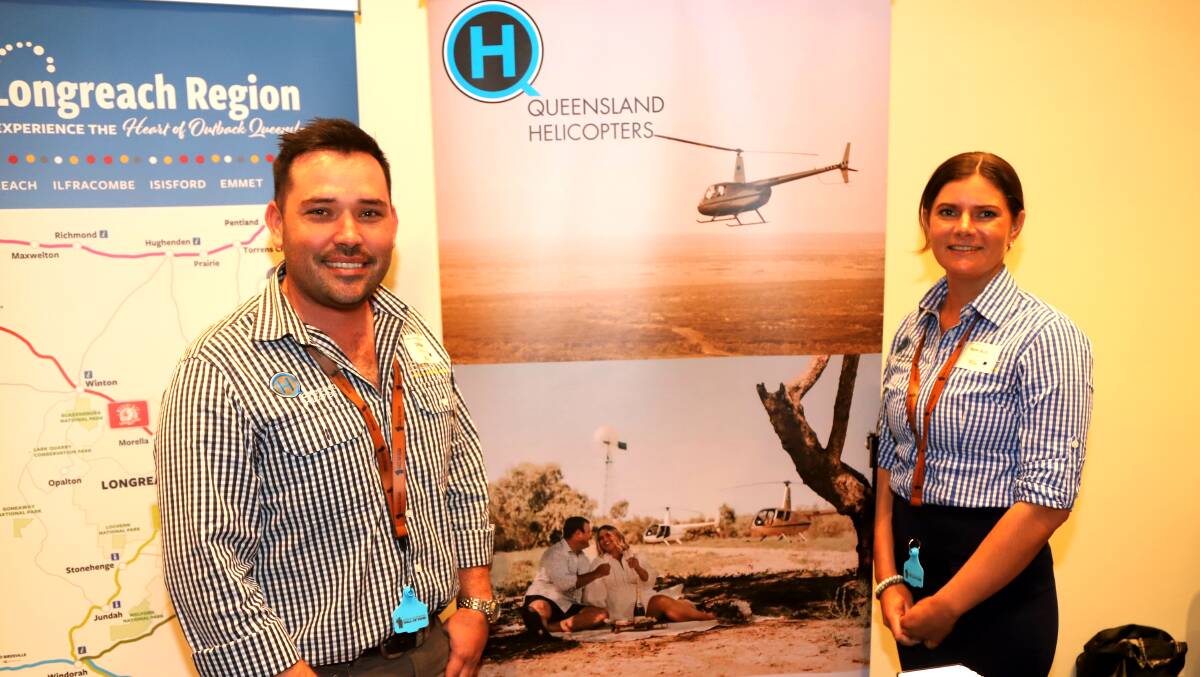 Queensland Helicopters Longreach base manager Chris Kirk with Mardi Bush at the Outback Queensland Tourism Association's 2023 season launch in Brisbane. Picture: Sally Gall