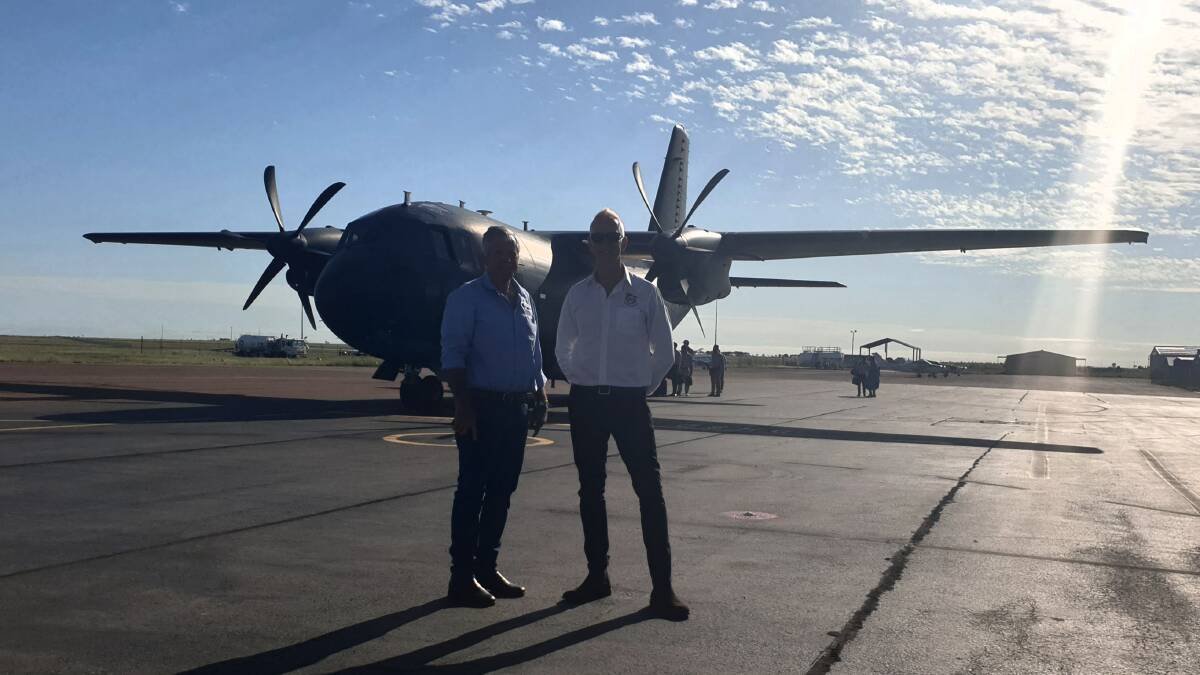 Longreach Mayor Tony Rayner and councillor Tony Martin, pictured on the Longreach airport tarmac, hope a briefing with Prime Minister Scott Morrison this week will help provide liftoff for the repurposing of the mothballed Longreach Pastoral College.