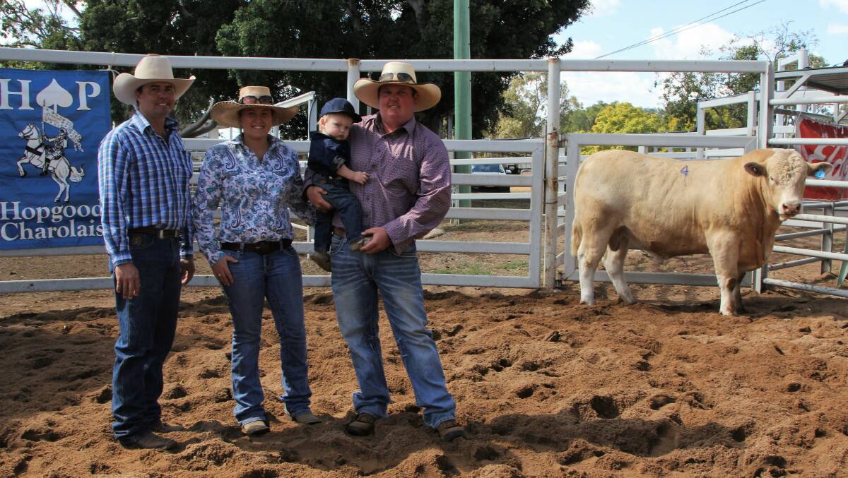 Mark Hopgood with Abbey and Levi Rickertt and son, and the top priced Hopgood Merchant.