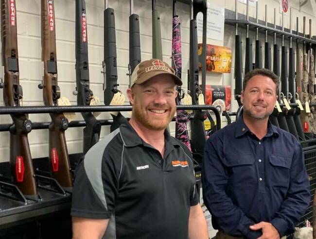 KAP's Nick Dametto, pictured with business owner Anthony Pagan, has been outspoken about bureaucratic overreach and its effect on firearms dealers.