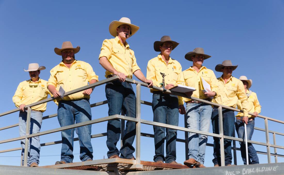 The Ray White selling team - Brock Palmer, Bill Seeney, Liam Kirkwood, AJ Riley, Harry Larnach, Tim O'Dwyer, and Corinne Anderson - in action at the sale.