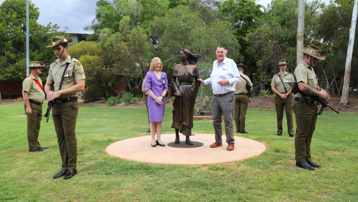 Queensland Governor Jeannette Young and Greta Towner's nephew John Towner unveil the statue to Greta Towner in Blackall's Memorial Park on Friday evening. Picture: Sally Gall