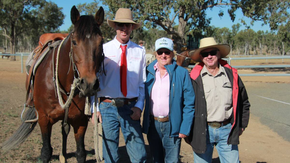 Luke Bennett, Willanga at Juandah Plains open campdraft winner, pictured holding Millungeras Moon Beam, with his parents Maree and Roger Bennett. Picture: Robyn Paine