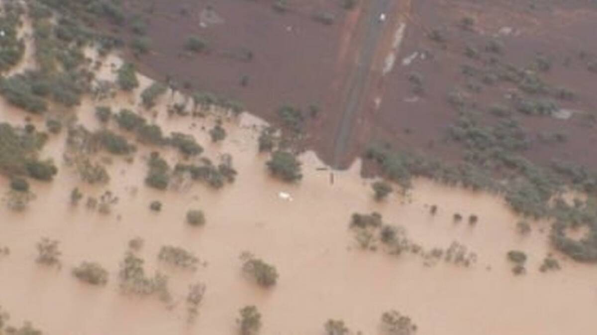 An aerial view of the submerged campervan in the Diamantina River west of Winton. Photos supplied by police media.
