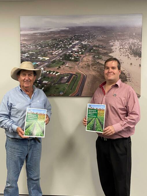 Richmond Shire Mayor John Wharton and CEO Peter Bennett pictured in 2021 with the agriculture project overview brochure they used to seek funding. Picture: Sally Gall