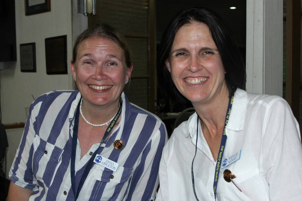 Queensland ICPA treasurer, Anna Appleton, shares a laugh with retiring publicity officer, Natalie Kenny.