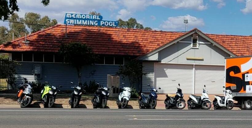 Scooters parked up while riders cool off at Mitchell's swimming pool. Picture supplied.