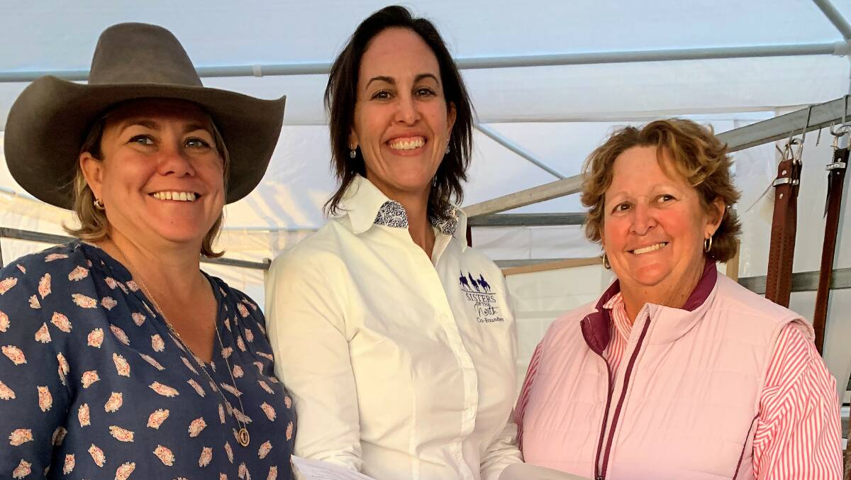 Shelley Curr, Wensley Station, Julia Creek, Susan Dowling Sisters of the North, Cloncurry, and Patrice Elliott, Karoola Station, Winton, at the announcement of the new assistance registration pack.