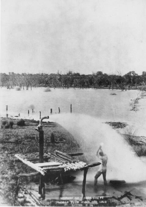 Man bathing in the water from an artesian bore in the Cunnamulla District, Queensland, ca. 1894. Picture: State Library of Queensland