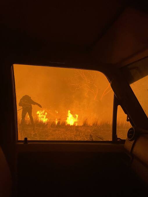 A volunteer firefighter battling the blaze in the Torrens Creek region. Picture: Sharon Jonsson