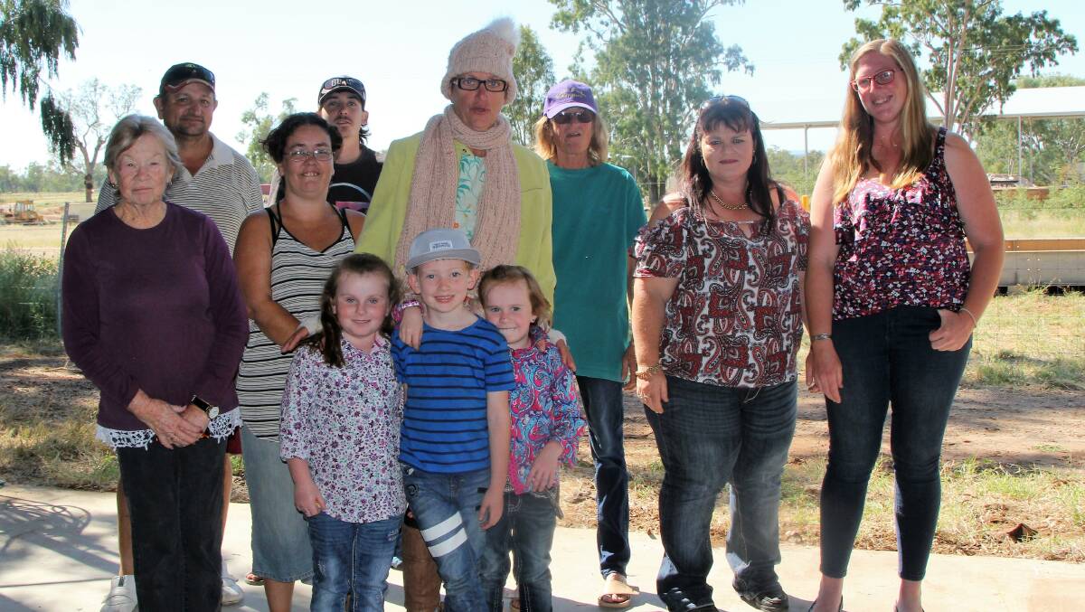 Some of the staff working at the sawmill, and their families, were on hand for the opening.