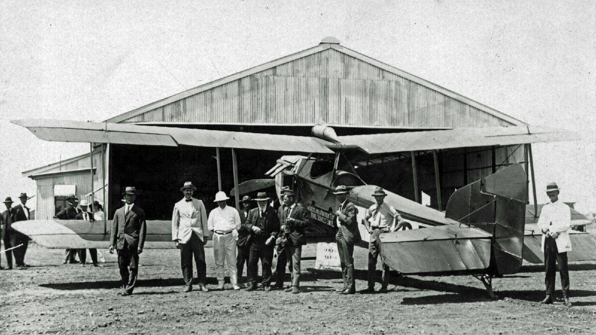 A Qantas plane in front of the company's hangar in Longreach back in its early days. File picture.