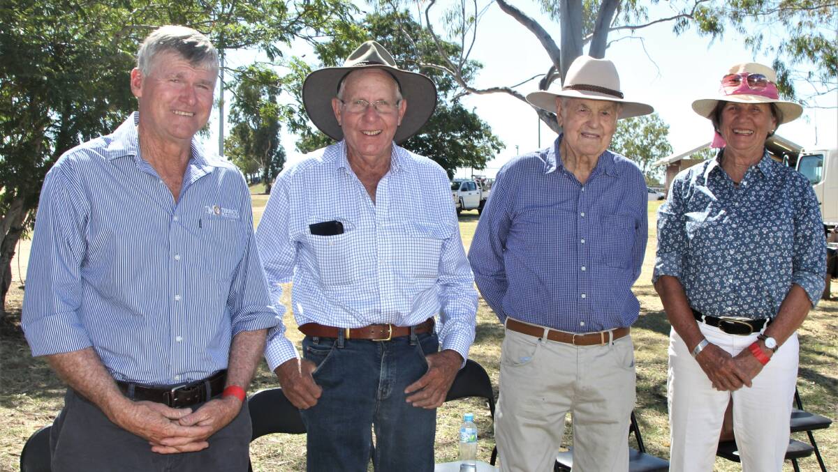 Peter Harvey, second right, with other renowned western Queensland Merino industry leaders who jackarooed under him at Terrick, Rick Keogh, Terrick Merinos, and Peter Clark, Leander, Longreach, with Elizabeth Clark watching the flock ewe judging at the Blackall Show.