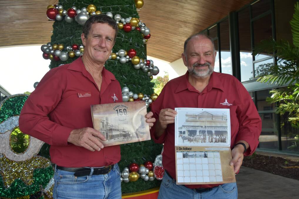 Charters Towers mayor Frank Beveridge and deputy mayor Graham Lohmann with two of the calendars. Picture supplied.