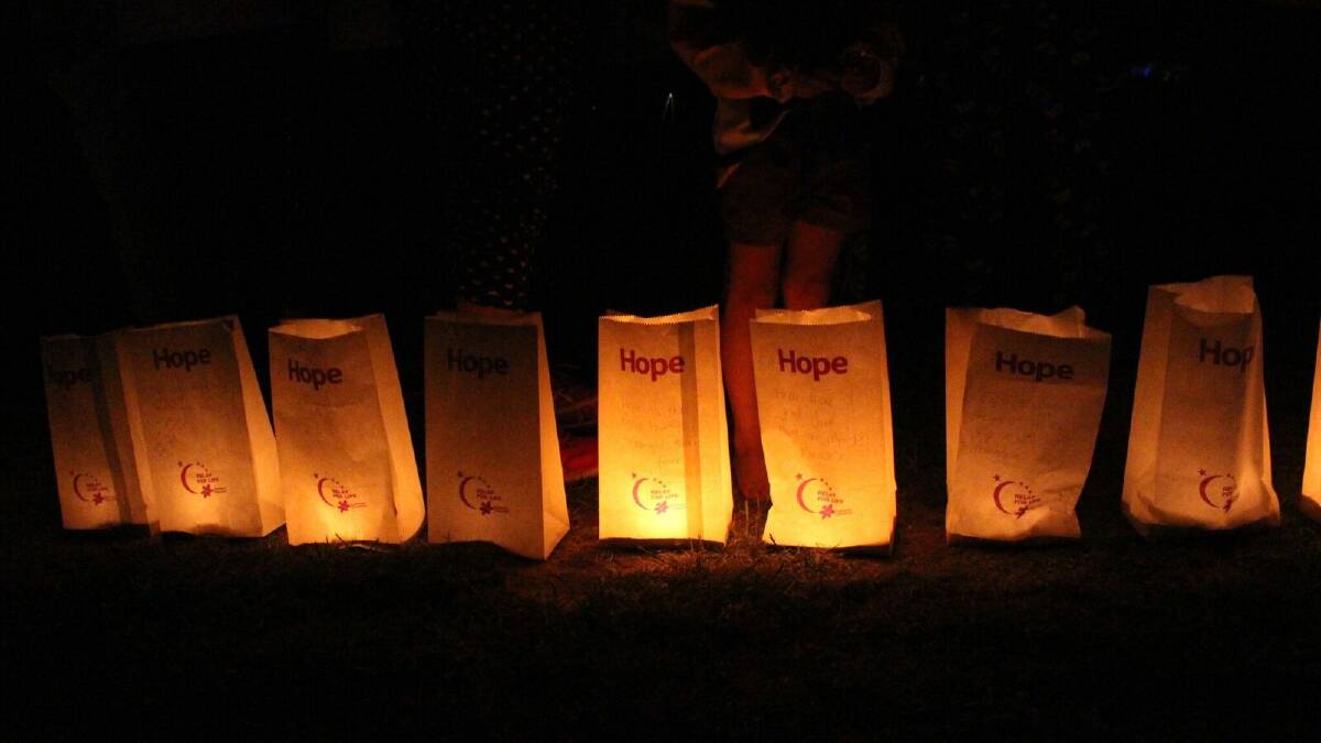 A snapshot from the emotive candlelight tribute to those lost to cancer in the Hughenden community, and to those who have survived, and for the many carers. Photo contributed.