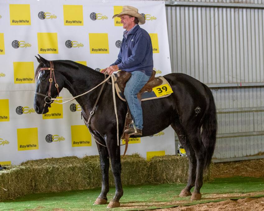Vendor Warwick Lawrence with the top selling horse sold online, Hunter View Rhyme, which made $27,000 at the Ray White Epic Horse Sale and Campdraft.