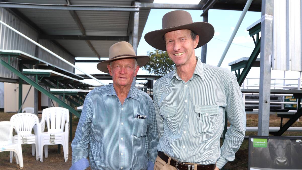 Moongool's Ian Price discusses the attributes of the top priced bull with ANC principal Andrew Cass. Picture: Sally Gall