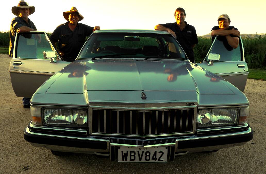 Ross Johnson, Pompey Pezzelato, Neal Rockley and Alan Poggioli getting ready to cruise around the Queensland countryside in their Statesman de Ville, for charity.