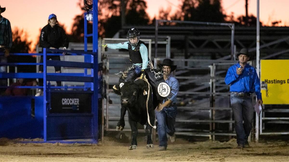Ten-year-old Byron Kirk competing in the mini bull ride at the Julia Creek Dirt n Dust Festival in April. Picture supplied.
