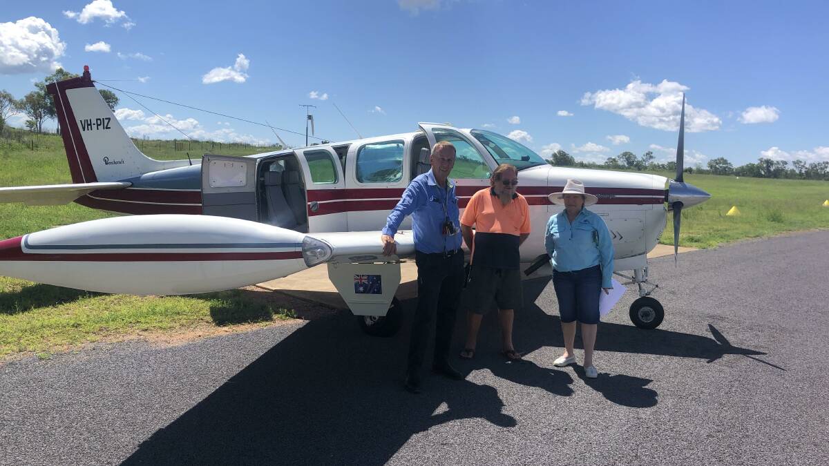 Angel Flight pilot Rodney Battle with Lyle Stacpoole and Tammy Hughes. Picture: Supplied