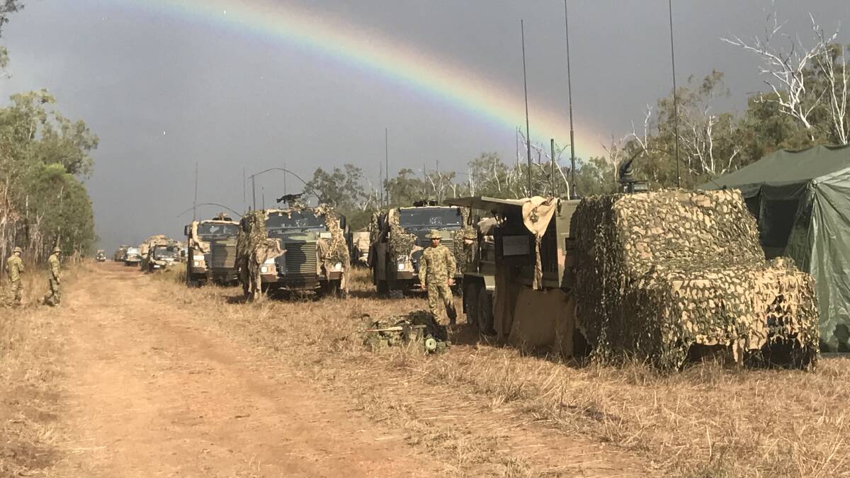 After the rain, the sun comes out over a convoy during the Operation.