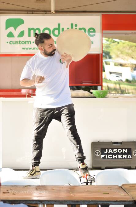 THROW IT: Pizza technician Youssef Ben-Touati is renowned for wowing the crowds with his fun pizza acrobatics.