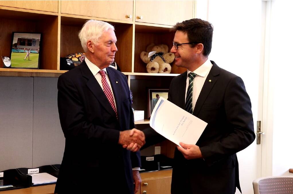  National Soil Advocate Major General Michael Jeffery (left) presenting his new report to Agriculture and Water Resources Minister David Littleproud.