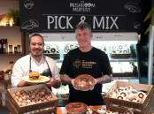 MIXING: Celebrity chef Adam Liaw and Joel Houghton, Kingsmore Meats, Coogee, NSW inside the Mushroom Meatery which encouraged shoppers to combine mushrooms and meat. 