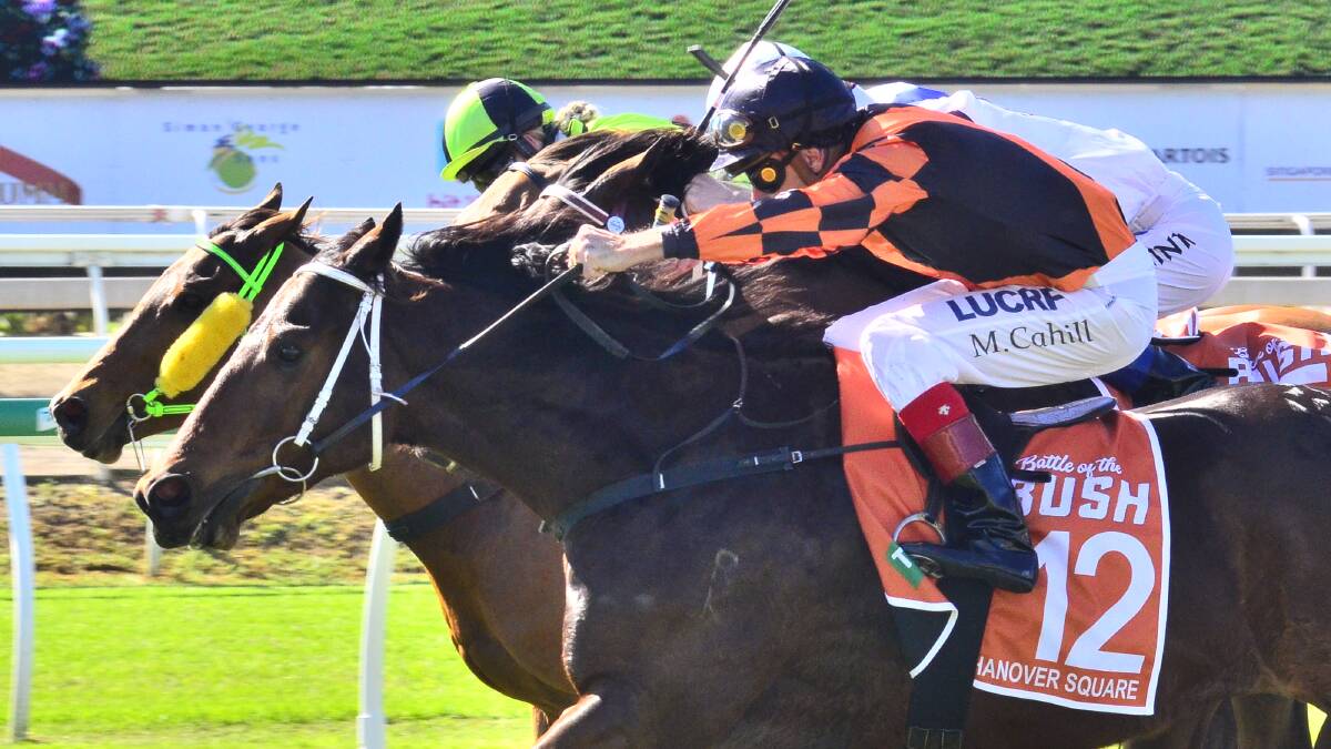 Narrow winner of the 2019 Battle of the Bush at Eagle Farm was Miles-based Hanover Square (outside) ridden by Michael Cahill. Racing Queensland has announced six new venues will take part in the 2020 TAB Battle of the Bush Series. Picture: Racing Queensland