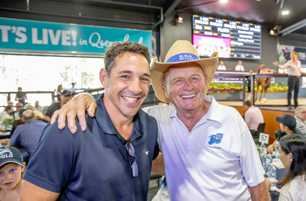 SALE SUCCESS: Billy Slater is congratulated by Magic Millions co-owner Gerry Harvey after his horse sold for $180,000 at the Magic Millions sales. Picture: Luke Marsden.