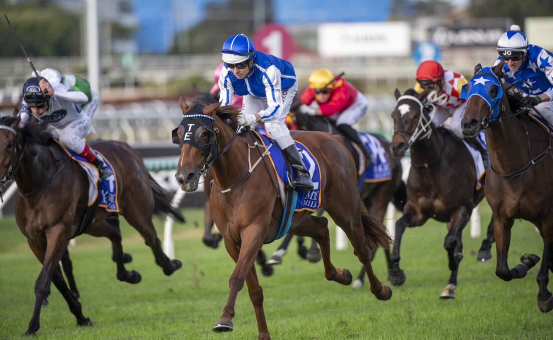 Dominant 3YO filly Vanna Girl (blue and white colours ) ridden by Brad Stewart surges ahead to win the Group 2 The Roses at Eagle Farm. Picture: Racing Queensland