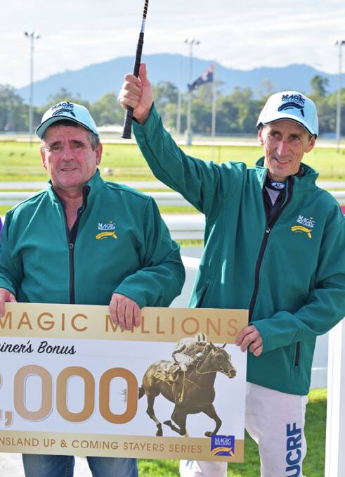 Cairns-based trainer Rodney Miller (left) and jockey Kirk Stone celebrate after Miller’s horse Barwon wins the Magic Millions Far North Queensland Up and Coming Stayers Series.