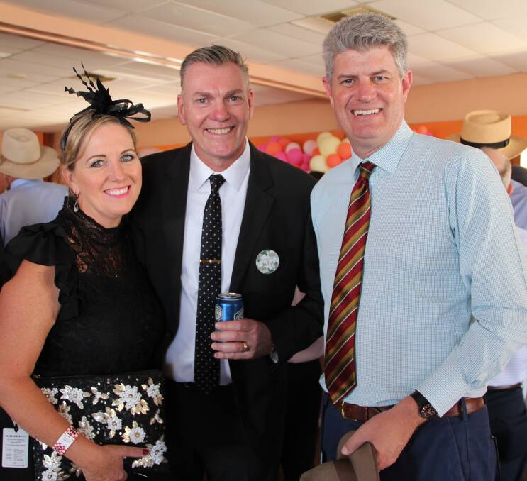 Racing Minister Stirling Hinchliffe (right) chats with Brisbane visitors Theresa and Tony Coates, Brisbane Riverview Hotel, at the Roma Cup meeting. 