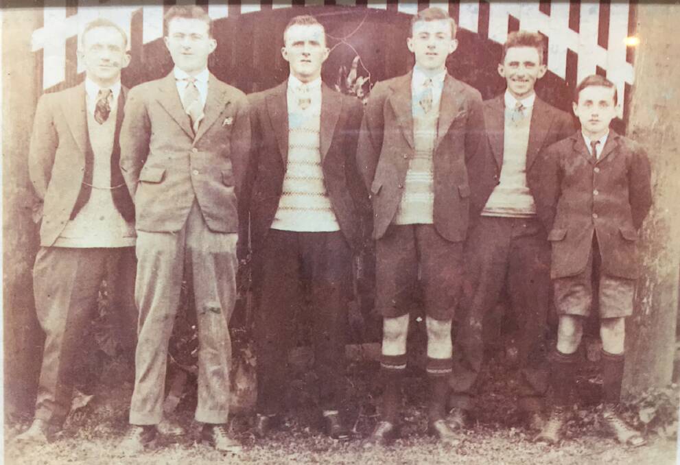 Six Hughes brothers are in a photo taken by amateur rider George Gordon the day after Edroex won the Kilcoy Cup in 1928. They are (from left) Jim, Bill, Artie, Bert, Alec, and Len Hughes.