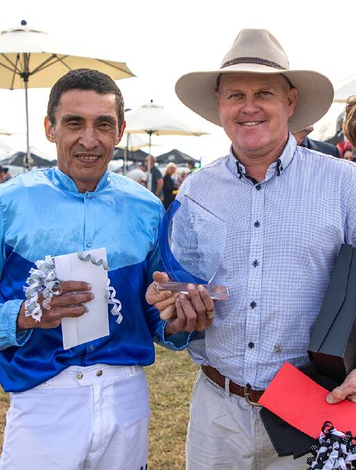 Winning jockey and trainer of Townsville Amateurs Cup winner Sensation Ally were Frank Edwards and John Manzelmann. Picture: Mike Mills