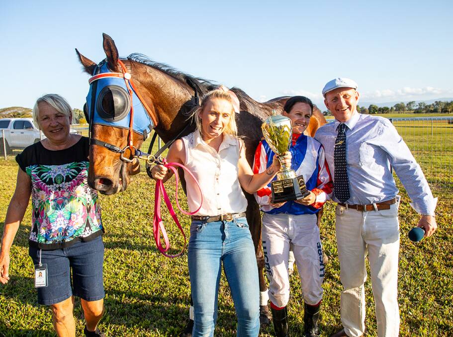 Celebrating the Ingham Gold Cup win by Captains Way were Mackay trainer Jade Doolan (holding horse and Cup), Jades mother Vivian Doolan (left), jockey Bonnie Thomson and race commentator 'Bluey' Forsyth. Picture - Mike Mills 