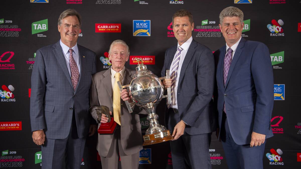 RQ chairman Steve Wilson, Winning Ways trainer Garry Newham, Tabcorp Head of Wagering - Queensland Sean Scott and Racing Minister Stirling Hinchliffe with the Horse of the Year trophy.