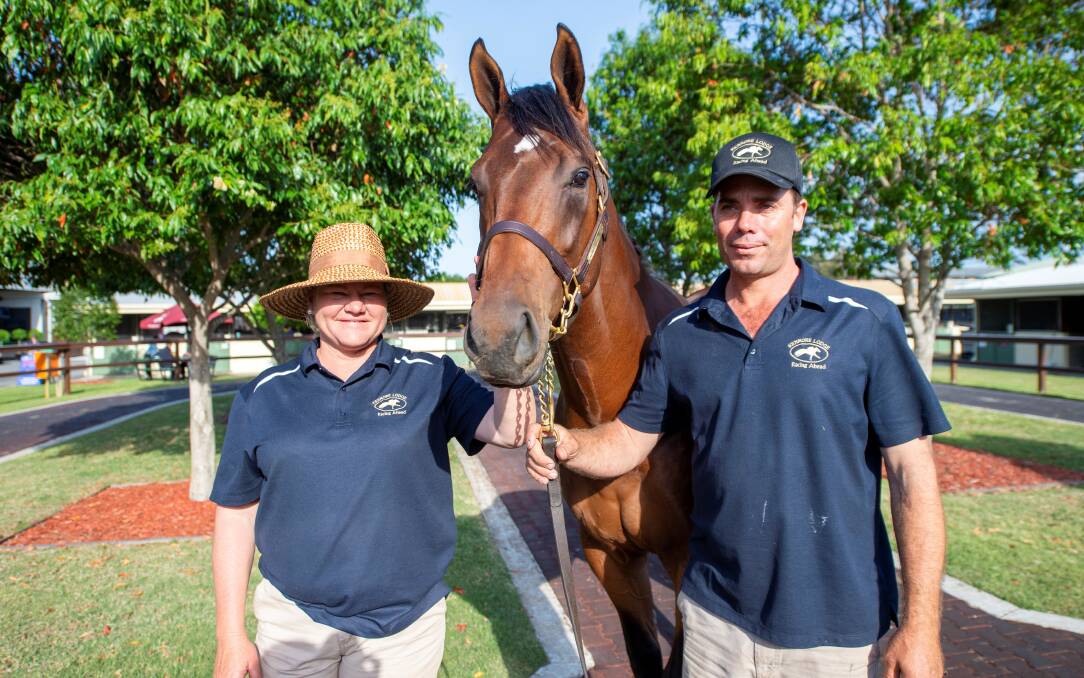 Kellie and Cameron Bond, Kenmore Lodge, Wyreema, with the top priced lot they sold for $210,000 on Day 1 of the Magic Millions 2YO sale a colt by Deep Field from Khamsa. Picture: Magic Millions