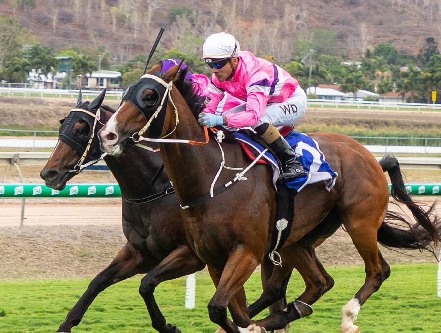 Polar Blast (outside) ridden by Wanderson DAvila beats his stablemate Space Time ridden by Chris Whiteley in the Magic Millions Country Cup qualifying race at Townsville on Saturday, December 14. Both horses are trained by Tolga-based Janel Ryan. Picture: Mike Mills